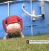 A woman speaks to the camera then takes a dump in the grass next to a pool. About 2.5 minutes.